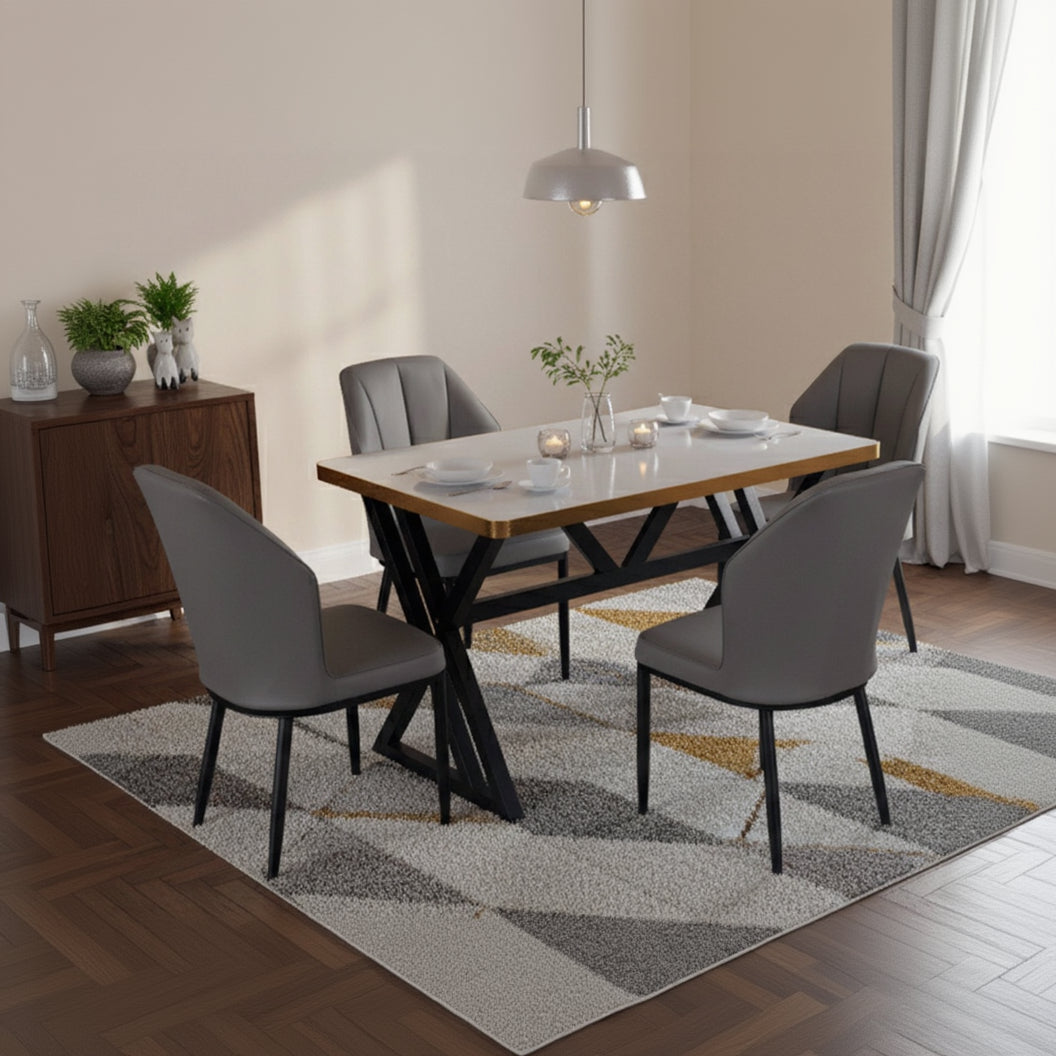 Dining room with a wooden table and gray chairs on a patterned rug.
